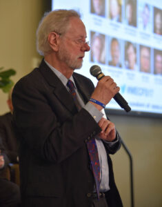 symposium-ron-davis-speaking-235x300.jpg